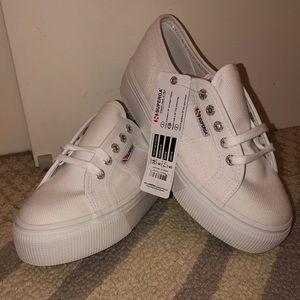 Never worn white supergas